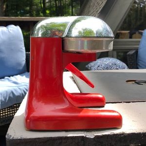 Antique red juice king juicer